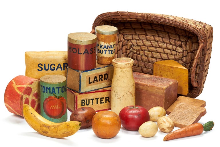 Primitive Carvings of Wooden Fruit, Vegetables, and Groceries made by the Delta Art Center,...