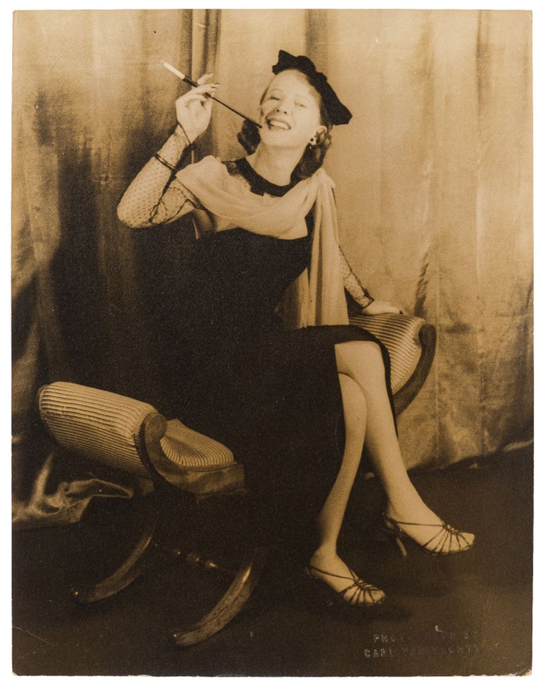 Item #440942 [Portrait Photograph]: Julie Harris with cigarette holder. Julie HARRIS, Carl VAN VECHTEN.