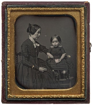 Item #468444 [Daguerreotype]: Portrait of a mother with a little girl, who is holding a...