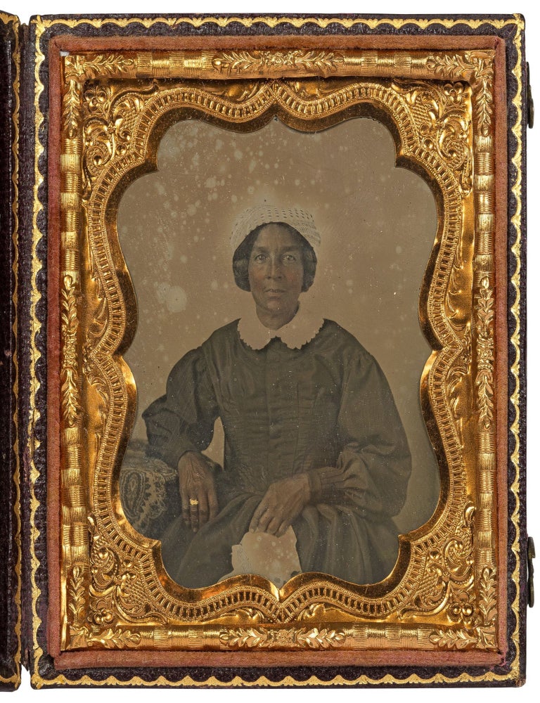 Item #588299 [Ambrotype]: African-American Woman, possibly a Domestic Worker. Photography.