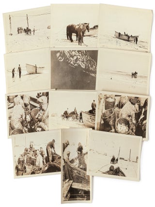 Item #601599 Twelve vernacular photographs of a small fishing operation, likely in New York or...