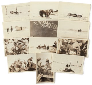 Item #601599 Twelve vernacular photographs of a small fishing operation, likely in New York or...