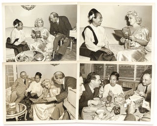 Item #615282 Four Vintage Photographs of a Dinner Party with Mae West as Guest of Honor. Mae WEST