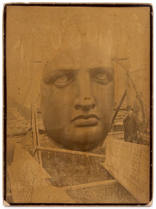 Item #624378 [Photograph]: The Face of the Statue of Liberty uncrated on Liberty Island...